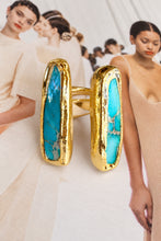 Easton Elle Linear Doubled Ring Turquoise, enhanced product photograph on fashion magazine