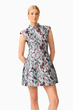 Bloomia Tulip Mini Dress in Brown & Blue Floral with a high neckline and cap sleeves close up shot
