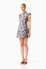 Bloomia Tulip Mini Dress in Brown & Blue Floral with a high neckline and cap sleeves side shot