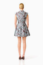 Bloomia Tulip Mini Dress in Brown & Blue Floral with a high neckline and cap sleeves back shot