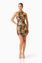 Irisa Shift Mini Dress in Brown & Gold Floral with rhinestone collar and jacquard fabrication posed shot