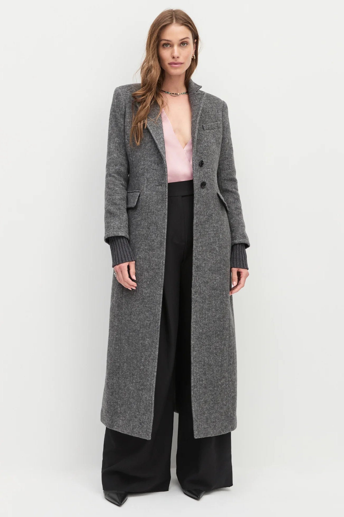 Model wearing the City Coat in grey twill
