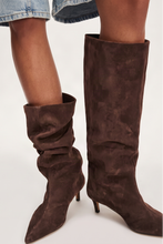 Free People Kiki Kitten Heel Boots in Chocolate Suede, styled view showing the pointed toes and slouched shafts.