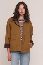 Heartloom Matin Jacket in Whisky, front model view showing the brown contrast collar and patch pockets.