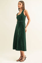 Side view of Kensley hunter green vegan suede midi dress