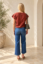 MIOU MUSE faux suede crop top in Rust, full-length back view