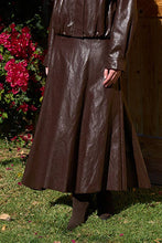 Moon River MS1004 Chocolate faux-leather midi skirt, close-up of flared hem and textured fabric