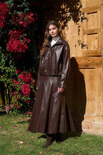 Moon River Chocolate faux-leather midi skirt showing high waist and A-line shape