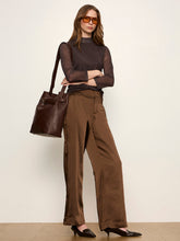 Sanctuary 3/4 Sleeve Mesh Mock Neck Top in Espresso Geo, full-length model view styled with brown trousers.