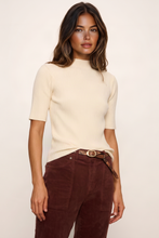 Sanctuary High Neck Ribbed Top in Bone, model view showing the high neckline and short sleeves.