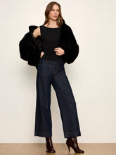 Sanctuary Scoop Back Tank in Black, layered look with a black jacket.