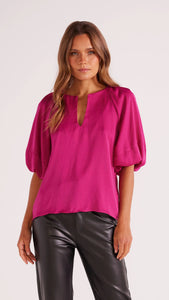 Hot pink short sleeve top with round neckline