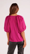 Pink blouse with gathered shoulders and elastic cuff