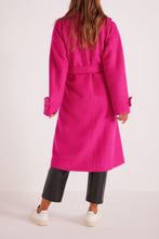 pink coat with tie waist and button cuffs