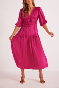 dress with v-neckline and gathered waist with ties