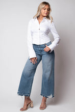 astr the label Serina Top 